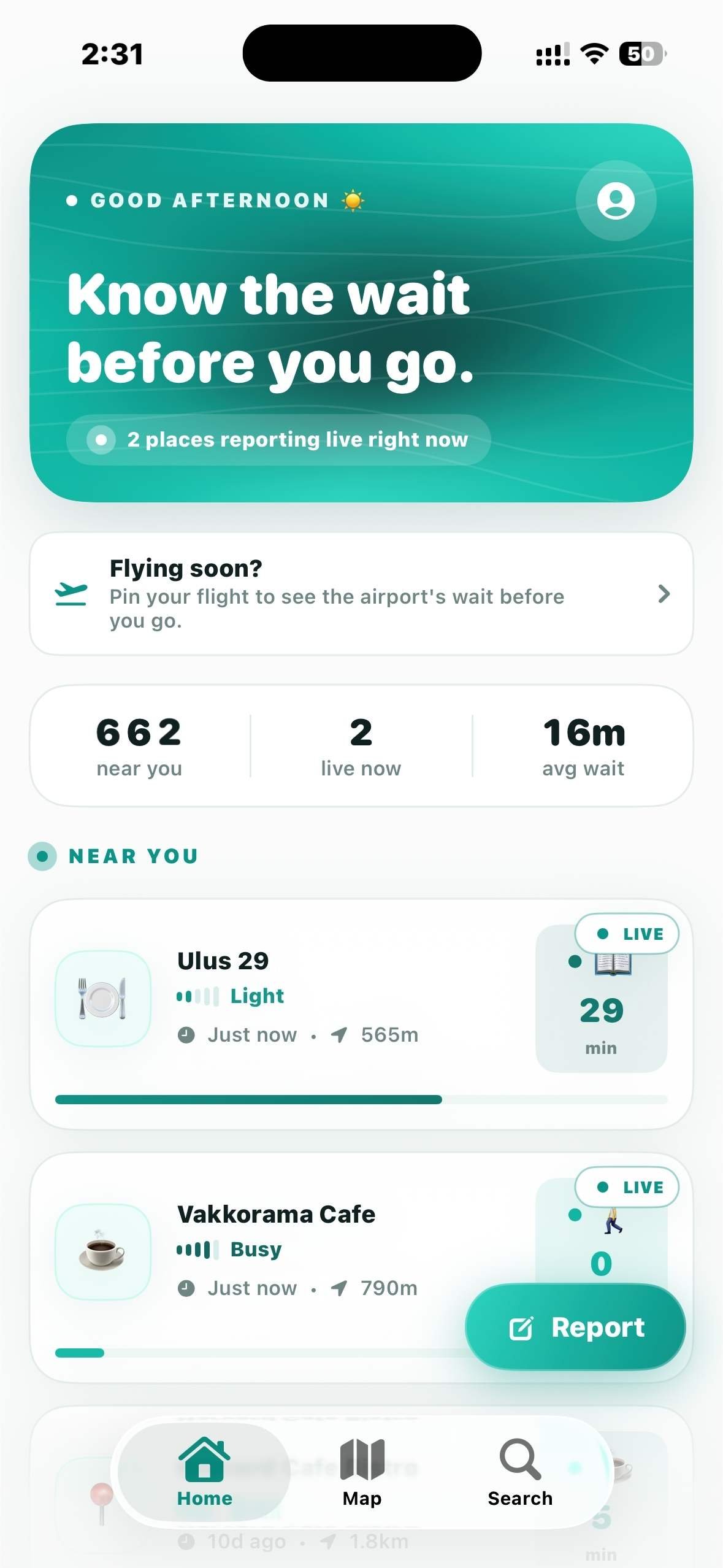The QueueBuddy home screen showing live wait times at nearby places